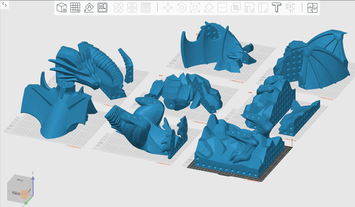 Pièces d’un modèle découpé, disposées dans un slicer pour l’impression 3D.