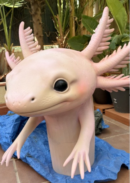 Miguel's axolotl after assembly, airbrush painting and protective clear coating.